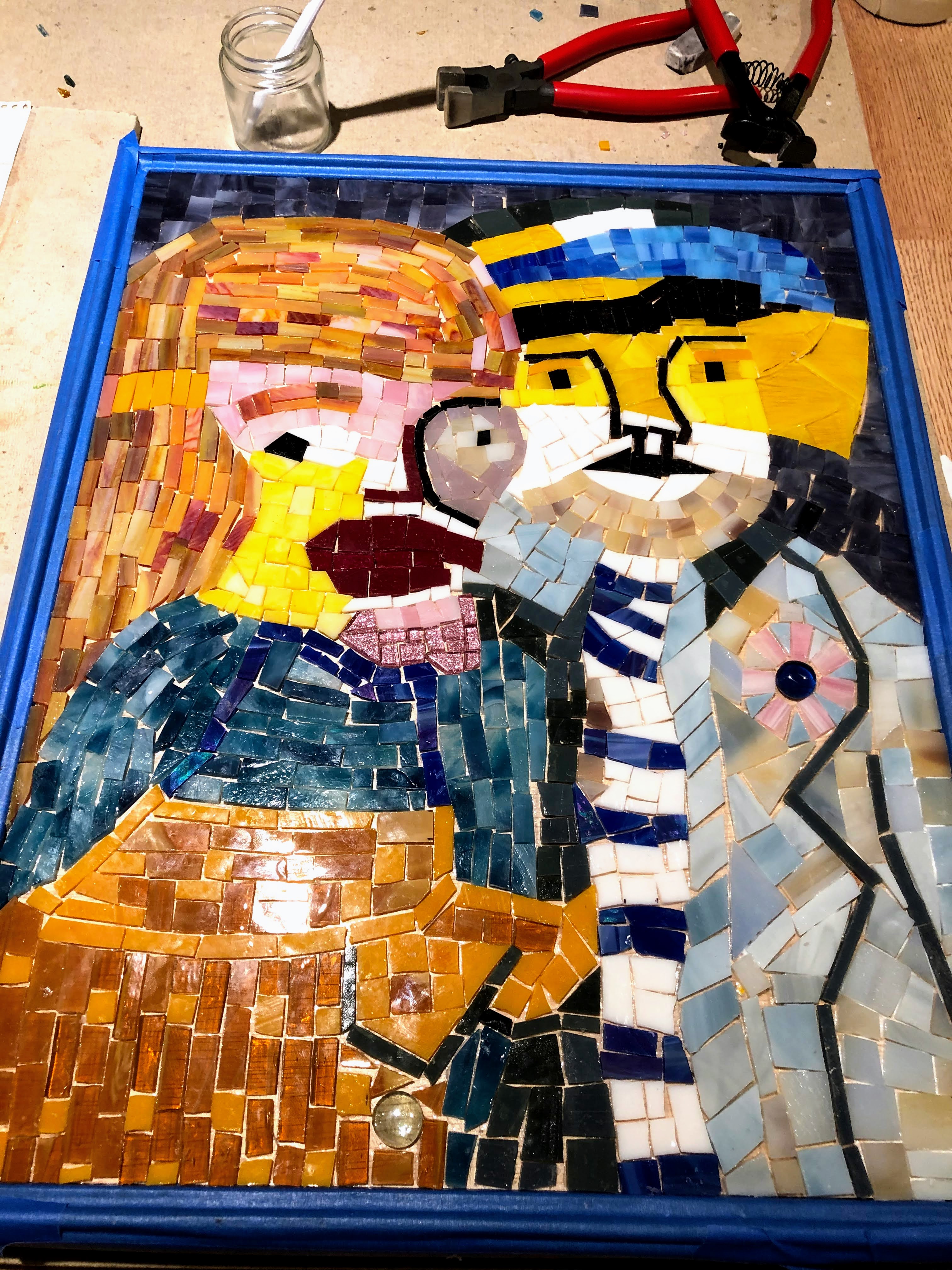 Family mosaic before grout