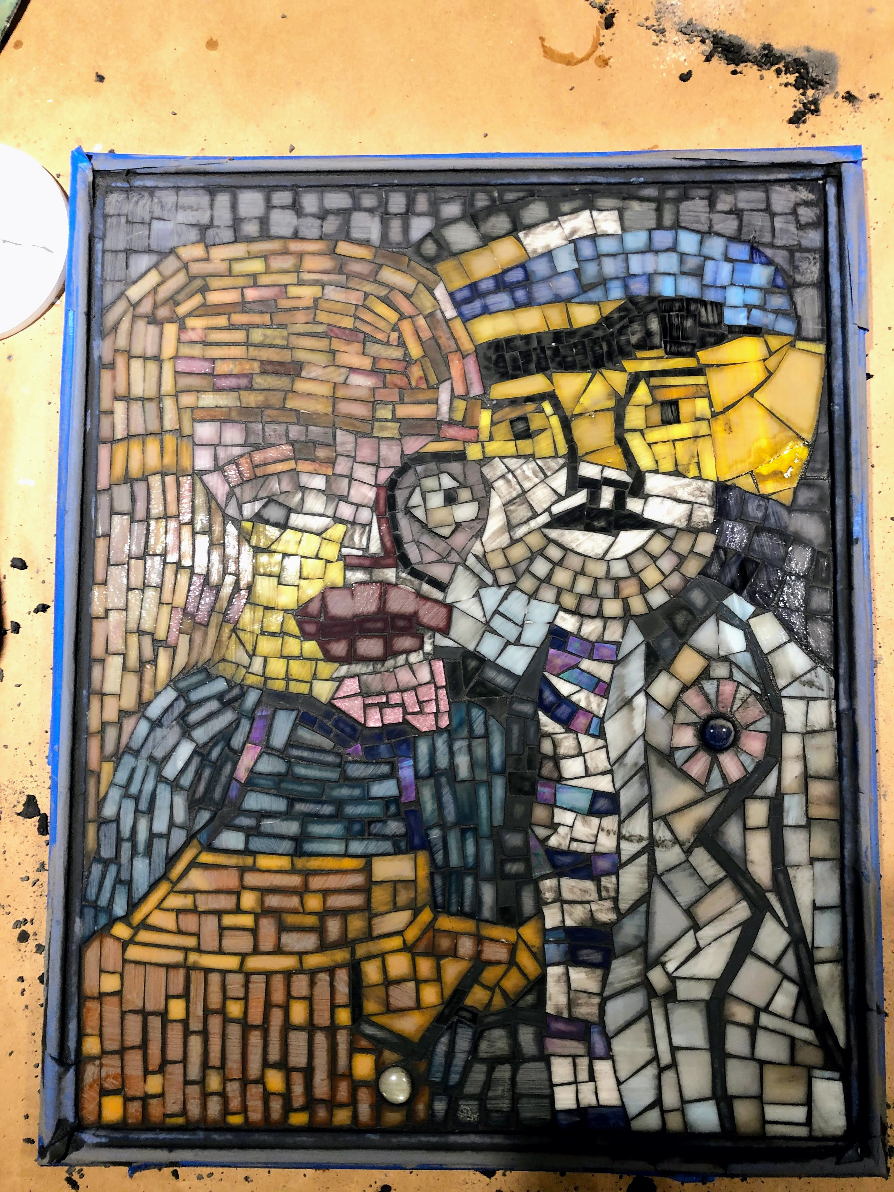 Family mosaic during grouting